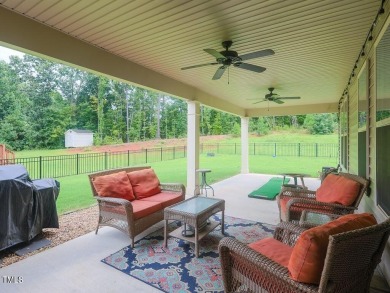 Nestled on a picturesque golf course lot, this thoughtfully on Olde Liberty Golf and Country Club in North Carolina - for sale on GolfHomes.com, golf home, golf lot