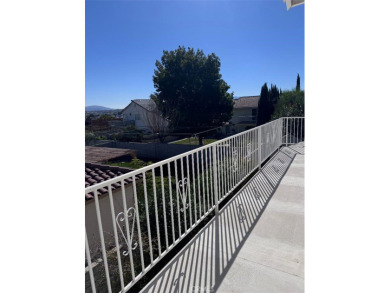 Beautifully maintained and cared for 5 bedroom 3 bath home in on Spring Valley Lake Country Club in California - for sale on GolfHomes.com, golf home, golf lot