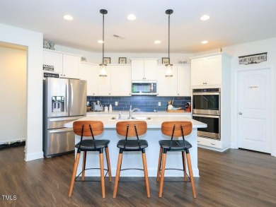 Nestled on a picturesque golf course lot, this thoughtfully on Olde Liberty Golf and Country Club in North Carolina - for sale on GolfHomes.com, golf home, golf lot