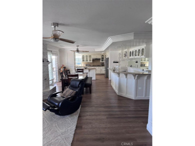 Beautifully maintained and cared for 5 bedroom 3 bath home in on Spring Valley Lake Country Club in California - for sale on GolfHomes.com, golf home, golf lot