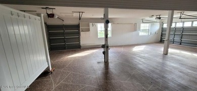 Resort living at its finest! 3/2 with screened porch, RV garage on The Great Outdoors Golf and Country Club in Florida - for sale on GolfHomes.com, golf home, golf lot