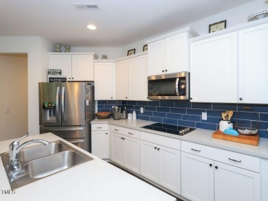 Nestled on a picturesque golf course lot, this thoughtfully on Olde Liberty Golf and Country Club in North Carolina - for sale on GolfHomes.com, golf home, golf lot