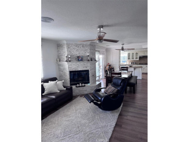 Beautifully maintained and cared for 5 bedroom 3 bath home in on Spring Valley Lake Country Club in California - for sale on GolfHomes.com, golf home, golf lot