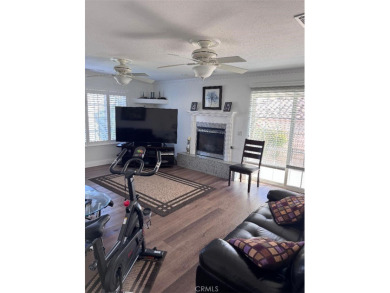 Beautifully maintained and cared for 5 bedroom 3 bath home in on Spring Valley Lake Country Club in California - for sale on GolfHomes.com, golf home, golf lot