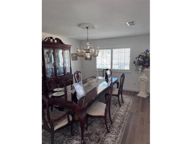 Beautifully maintained and cared for 5 bedroom 3 bath home in on Spring Valley Lake Country Club in California - for sale on GolfHomes.com, golf home, golf lot