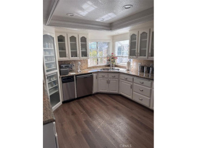 Beautifully maintained and cared for 5 bedroom 3 bath home in on Spring Valley Lake Country Club in California - for sale on GolfHomes.com, golf home, golf lot