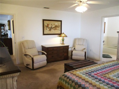 This ATTRACTIVE 3 BEDROOM HOME has a sensible split bedroom on Preserve Golf Club in Florida - for sale on GolfHomes.com, golf home, golf lot