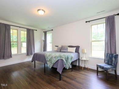 Nestled on a picturesque golf course lot, this thoughtfully on Olde Liberty Golf and Country Club in North Carolina - for sale on GolfHomes.com, golf home, golf lot