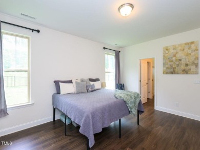 Nestled on a picturesque golf course lot, this thoughtfully on Olde Liberty Golf and Country Club in North Carolina - for sale on GolfHomes.com, golf home, golf lot