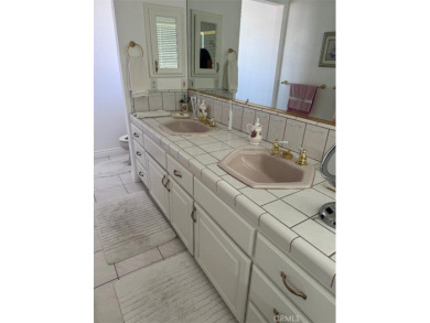 Beautifully maintained and cared for 5 bedroom 3 bath home in on Spring Valley Lake Country Club in California - for sale on GolfHomes.com, golf home, golf lot