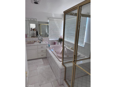Beautifully maintained and cared for 5 bedroom 3 bath home in on Spring Valley Lake Country Club in California - for sale on GolfHomes.com, golf home, golf lot