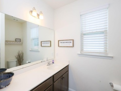 Nestled on a picturesque golf course lot, this thoughtfully on Olde Liberty Golf and Country Club in North Carolina - for sale on GolfHomes.com, golf home, golf lot