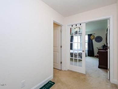 Nestled on a picturesque golf course lot, this thoughtfully on Olde Liberty Golf and Country Club in North Carolina - for sale on GolfHomes.com, golf home, golf lot