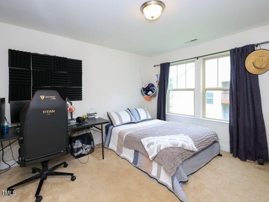 Nestled on a picturesque golf course lot, this thoughtfully on Olde Liberty Golf and Country Club in North Carolina - for sale on GolfHomes.com, golf home, golf lot