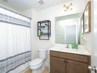 Nestled on a picturesque golf course lot, this thoughtfully on Olde Liberty Golf and Country Club in North Carolina - for sale on GolfHomes.com, golf home, golf lot