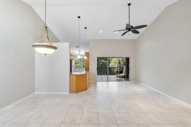 Stunning 3/2  upper corner unit with renovated open kitchen in on Bocaire Country Club in Florida - for sale on GolfHomes.com, golf home, golf lot