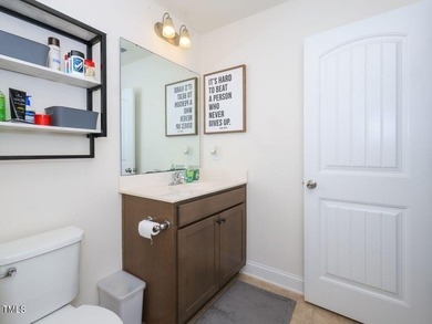 Nestled on a picturesque golf course lot, this thoughtfully on Olde Liberty Golf and Country Club in North Carolina - for sale on GolfHomes.com, golf home, golf lot