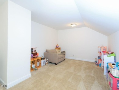 Nestled on a picturesque golf course lot, this thoughtfully on Olde Liberty Golf and Country Club in North Carolina - for sale on GolfHomes.com, golf home, golf lot