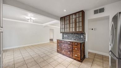 Beautifully updated 3 bed, 2 bath block home with a den on a on Palo Verde Golf Course in Arizona - for sale on GolfHomes.com, golf home, golf lot