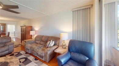 see Matterport Virt tour! Remarkable views to the 17th fairway on Palm-Aire Country Club and Resort - The Oaks in Florida - for sale on GolfHomes.com, golf home, golf lot