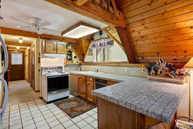 Charming chalet cabin nestled among the tall pines in Pinetop on Pinetop Lakes Golf and Country Club in Arizona - for sale on GolfHomes.com, golf home, golf lot