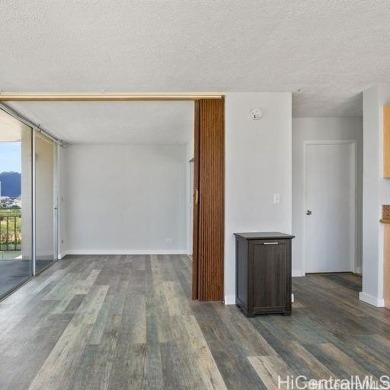 This charming condo has vinyl flooring in the unit with ceramic on Ala Wai Golf Course in Hawaii - for sale on GolfHomes.com, golf home, golf lot