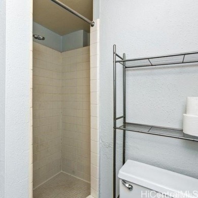 This charming condo has vinyl flooring in the unit with ceramic on Ala Wai Golf Course in Hawaii - for sale on GolfHomes.com, golf home, golf lot