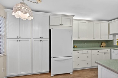 Rare first floor - corner unit in the centrally located Keystone on The Golf Club of Jupiter in Florida - for sale on GolfHomes.com, golf home, golf lot