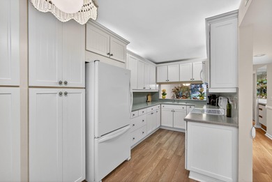 Rare first floor - corner unit in the centrally located Keystone on The Golf Club of Jupiter in Florida - for sale on GolfHomes.com, golf home, golf lot