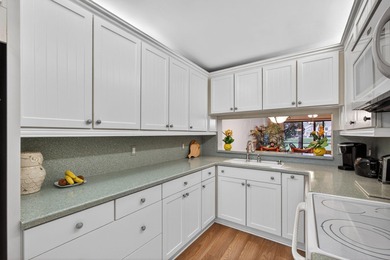 Rare first floor - corner unit in the centrally located Keystone on The Golf Club of Jupiter in Florida - for sale on GolfHomes.com, golf home, golf lot