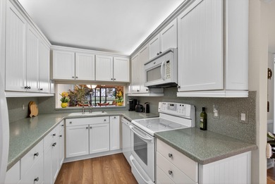 Rare first floor - corner unit in the centrally located Keystone on The Golf Club of Jupiter in Florida - for sale on GolfHomes.com, golf home, golf lot