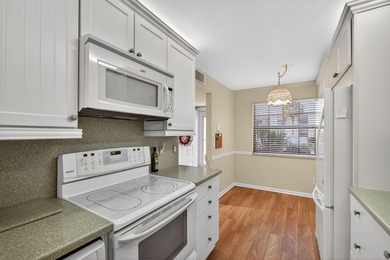 Rare first floor - corner unit in the centrally located Keystone on The Golf Club of Jupiter in Florida - for sale on GolfHomes.com, golf home, golf lot