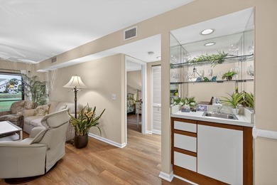 Rare first floor - corner unit in the centrally located Keystone on The Golf Club of Jupiter in Florida - for sale on GolfHomes.com, golf home, golf lot