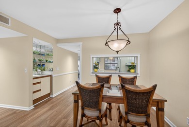 Rare first floor - corner unit in the centrally located Keystone on The Golf Club of Jupiter in Florida - for sale on GolfHomes.com, golf home, golf lot