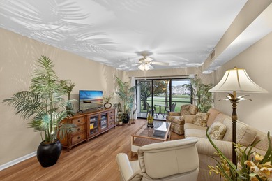Rare first floor - corner unit in the centrally located Keystone on The Golf Club of Jupiter in Florida - for sale on GolfHomes.com, golf home, golf lot