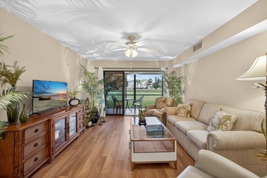 Rare first floor - corner unit in the centrally located Keystone on The Golf Club of Jupiter in Florida - for sale on GolfHomes.com, golf home, golf lot