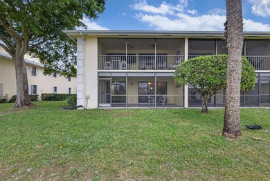 Rare first floor - corner unit in the centrally located Keystone on The Golf Club of Jupiter in Florida - for sale on GolfHomes.com, golf home, golf lot