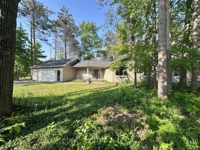 Welcome to Michaywe! This beautifully updated 3-bedroom, 2-bath on Michaywe Pines Course in Michigan - for sale on GolfHomes.com, golf home, golf lot