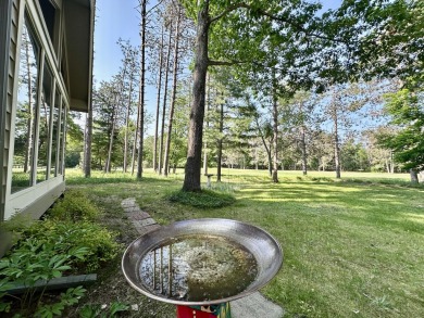 Welcome to Michaywe! This beautifully updated 3-bedroom, 2-bath on Michaywe Pines Course in Michigan - for sale on GolfHomes.com, golf home, golf lot
