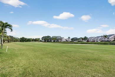 Rare first floor - corner unit in the centrally located Keystone on The Golf Club of Jupiter in Florida - for sale on GolfHomes.com, golf home, golf lot