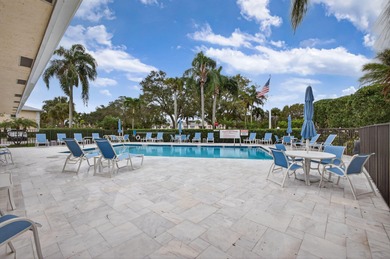 Rare first floor - corner unit in the centrally located Keystone on The Golf Club of Jupiter in Florida - for sale on GolfHomes.com, golf home, golf lot