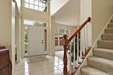 Welcome to this immaculately maintained home in the lovely gated on Boulder Ridge Country Club in Illinois - for sale on GolfHomes.com, golf home, golf lot