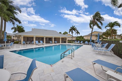 Rare first floor - corner unit in the centrally located Keystone on The Golf Club of Jupiter in Florida - for sale on GolfHomes.com, golf home, golf lot