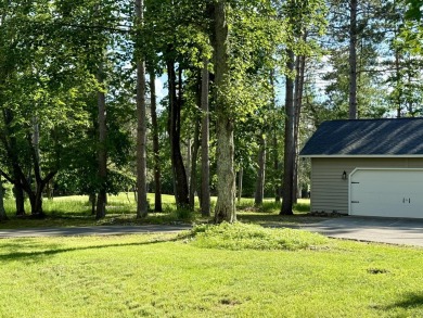 Welcome to Michaywe! This beautifully updated 3-bedroom, 2-bath on Michaywe Pines Course in Michigan - for sale on GolfHomes.com, golf home, golf lot