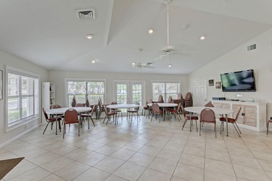 Rare first floor - corner unit in the centrally located Keystone on The Golf Club of Jupiter in Florida - for sale on GolfHomes.com, golf home, golf lot
