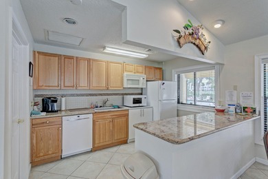 Rare first floor - corner unit in the centrally located Keystone on The Golf Club of Jupiter in Florida - for sale on GolfHomes.com, golf home, golf lot