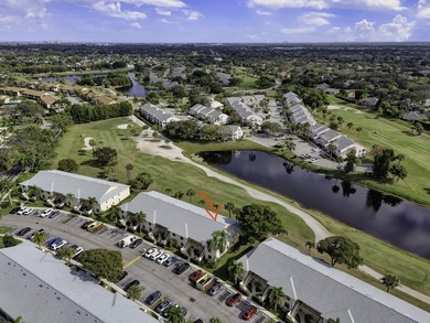 Rare first floor - corner unit in the centrally located Keystone on The Golf Club of Jupiter in Florida - for sale on GolfHomes.com, golf home, golf lot