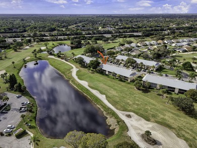 Rare first floor - corner unit in the centrally located Keystone on The Golf Club of Jupiter in Florida - for sale on GolfHomes.com, golf home, golf lot