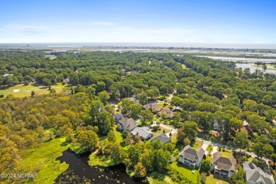 Beautiful home with stunning views must be seen to appreciate on Oyster Bay Golf Links in North Carolina - for sale on GolfHomes.com, golf home, golf lot