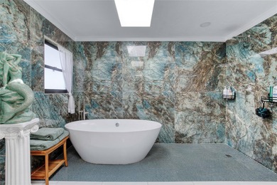 This extraordinary, designer-renovated 4-bedroom, 3-bath on Sugar Mill Country Club in Florida - for sale on GolfHomes.com, golf home, golf lot